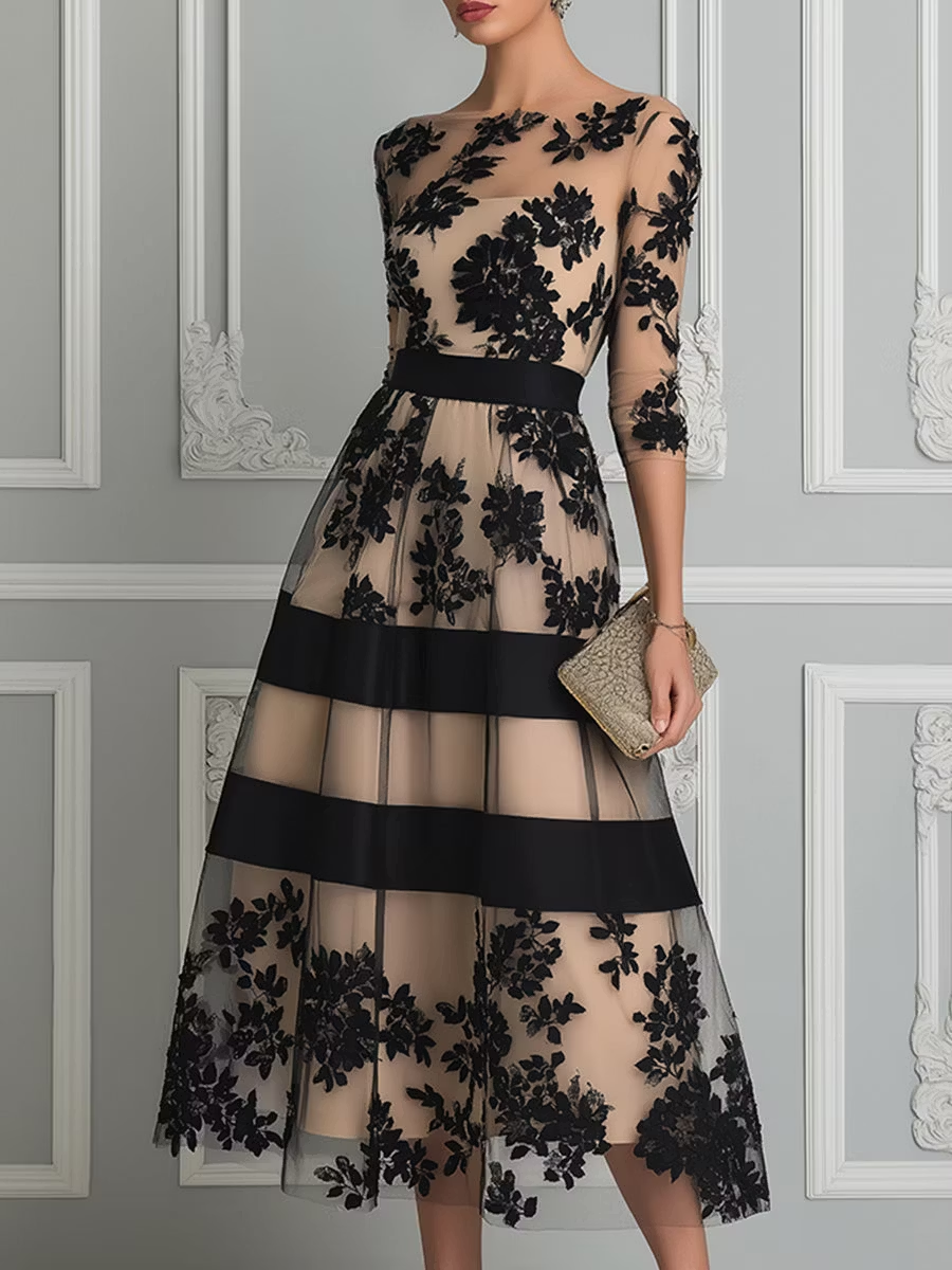 VESTIDO MIDI DE LÍNEA ELEGANTE EN ENCAJE NEGRO