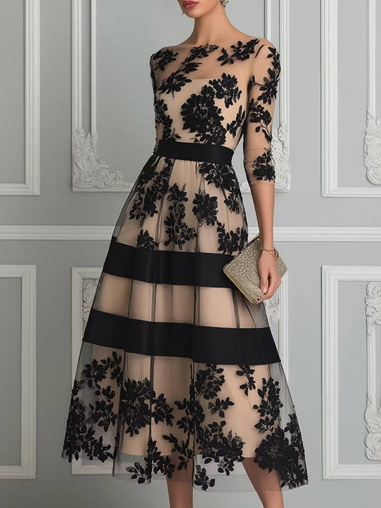 VESTIDO MIDI DE LÍNEA ELEGANTE EN ENCAJE NEGRO