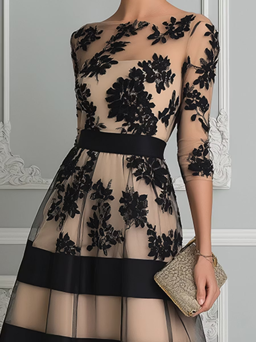 VESTIDO MIDI DE LÍNEA ELEGANTE EN ENCAJE NEGRO