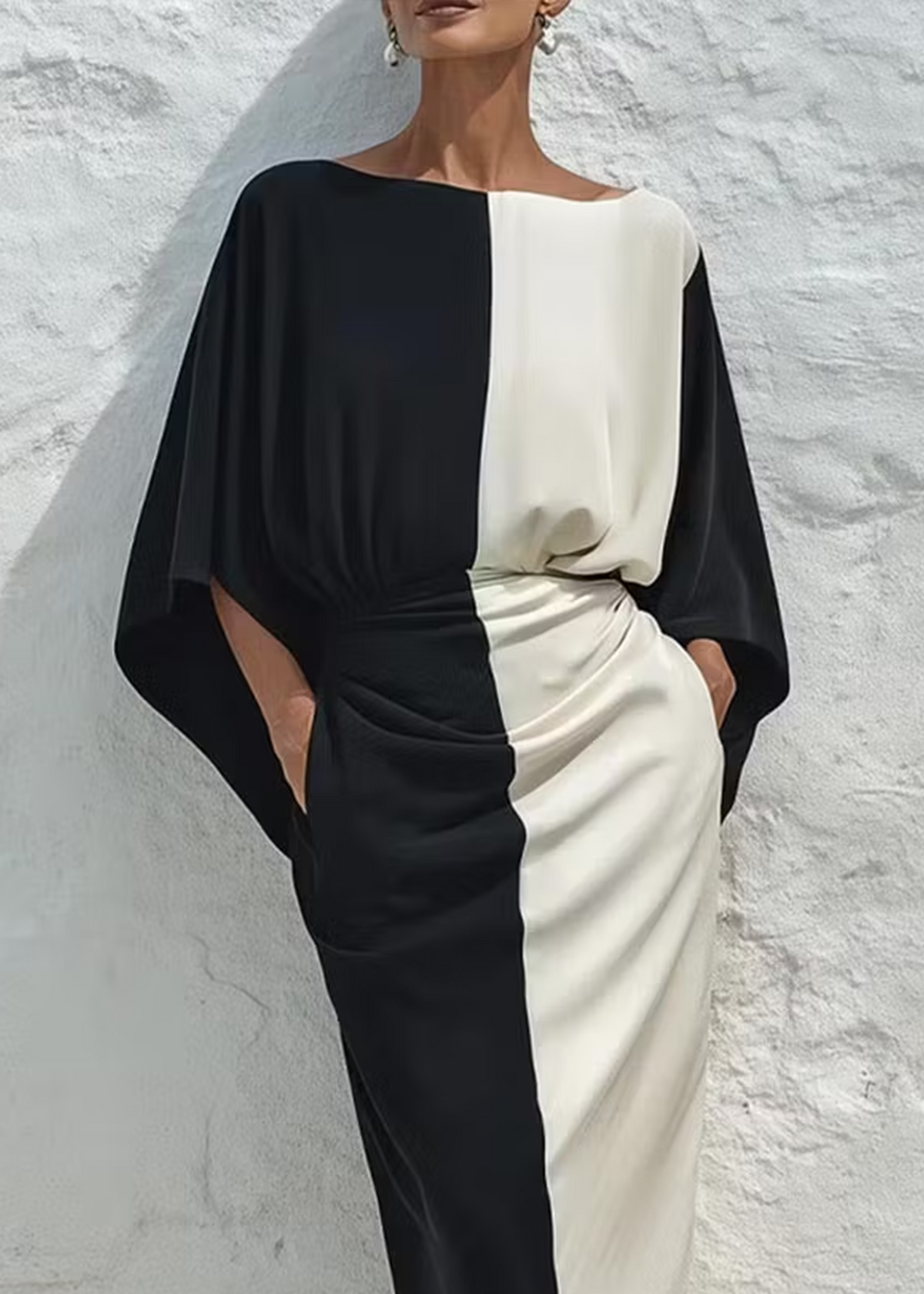 CONJUNTO DE DOS PIEZAS CON TOP Y FALDA MIDI EN CONTRASTE DE COLOR BLANCO Y NEGRO