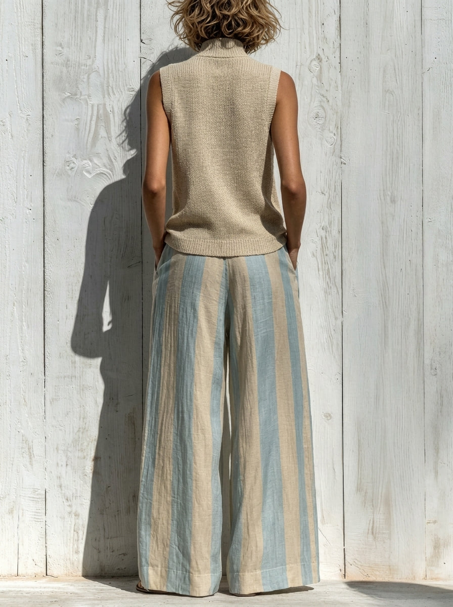 Completo top senza maniche e pantaloni a righe larghi