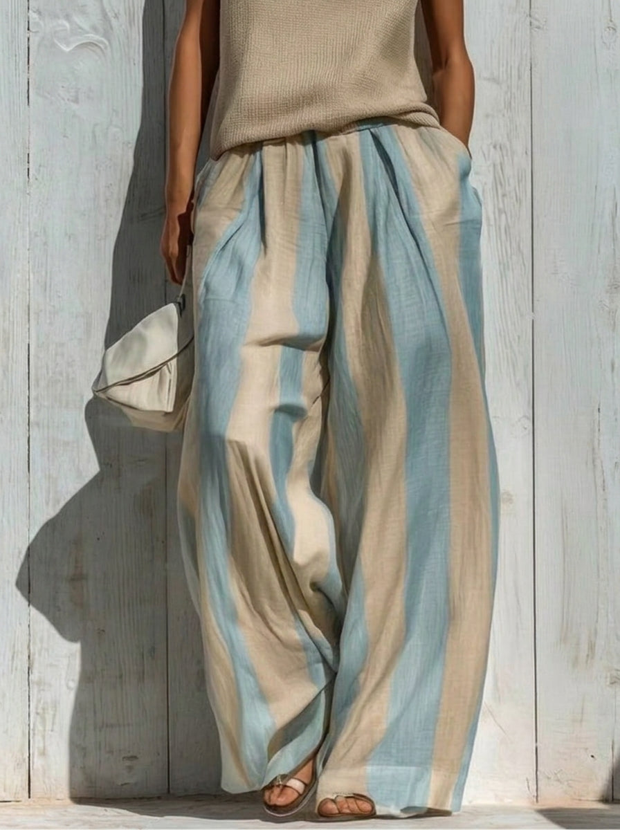Completo top senza maniche e pantaloni a righe larghi