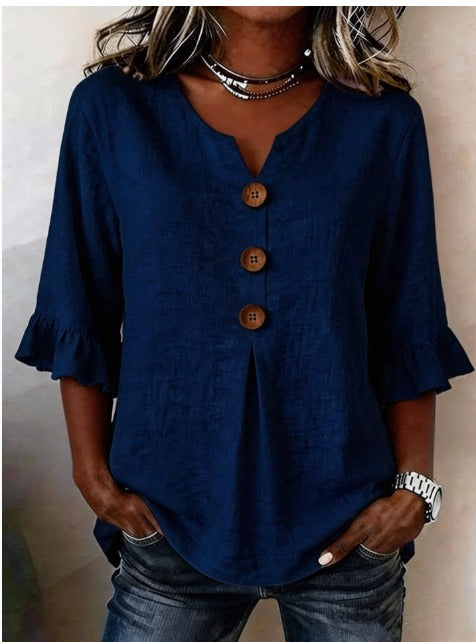 Blusa Sofía de algodón-lino lisa con botones de madera y volantes