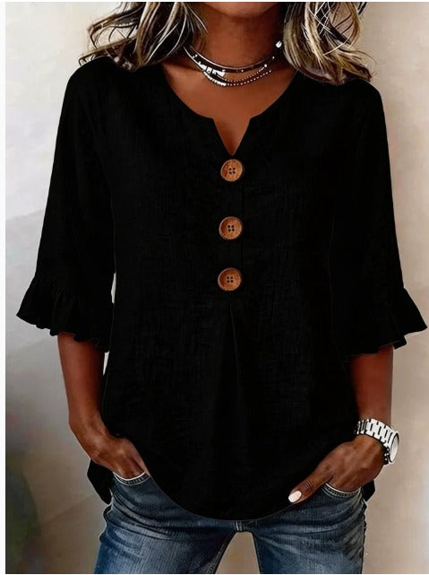 Blusa Sofía de algodón-lino lisa con botones de madera y volantes