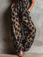 María™ | Elegante mono con estampado animal.