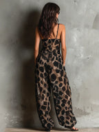 María™ | Elegante mono con estampado animal.