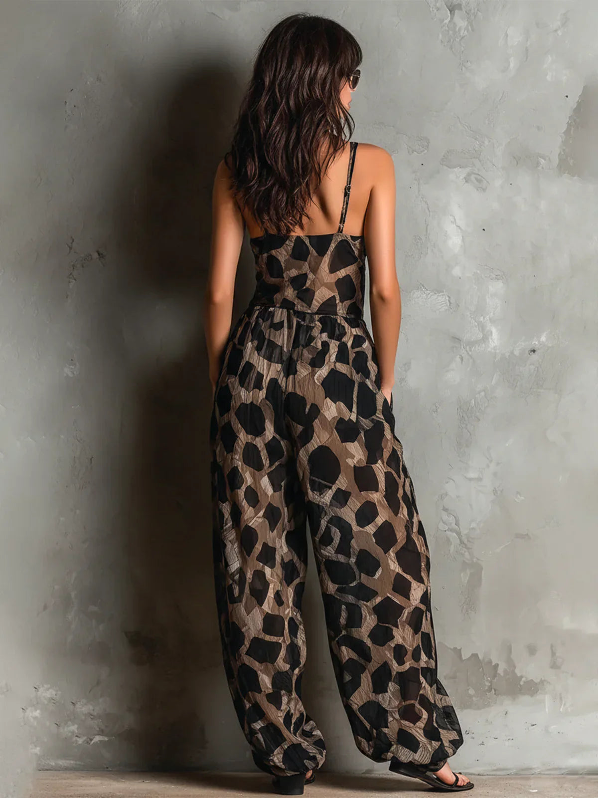 María™ | Elegante mono con estampado animal.