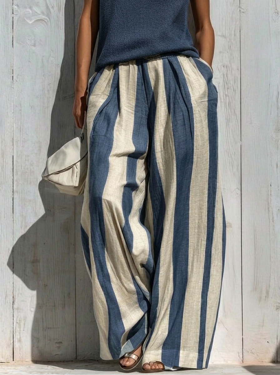 Completo top senza maniche e pantaloni a righe larghi